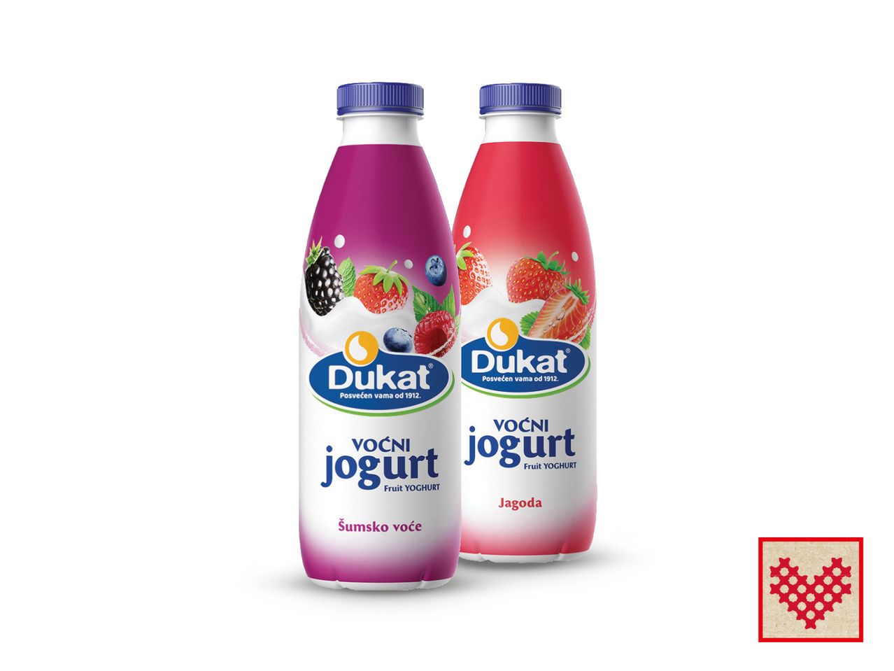 Dukat jogurti u bočicama s okusom bobičastog voća i jagode.