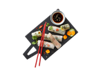 Rice paper rolls with vegetables and soy sauce.