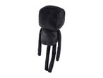 Black plush toy with a block-shaped head and long, thin limbs, standing upright.