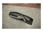 Remington beard trimmer on a concrete surface
