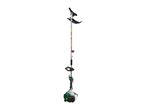 Petrol brush cutter with a black blade attachment and a green and white engine.