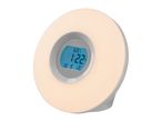 Round digital wake-up light alarm clock with a glowing warm light ring