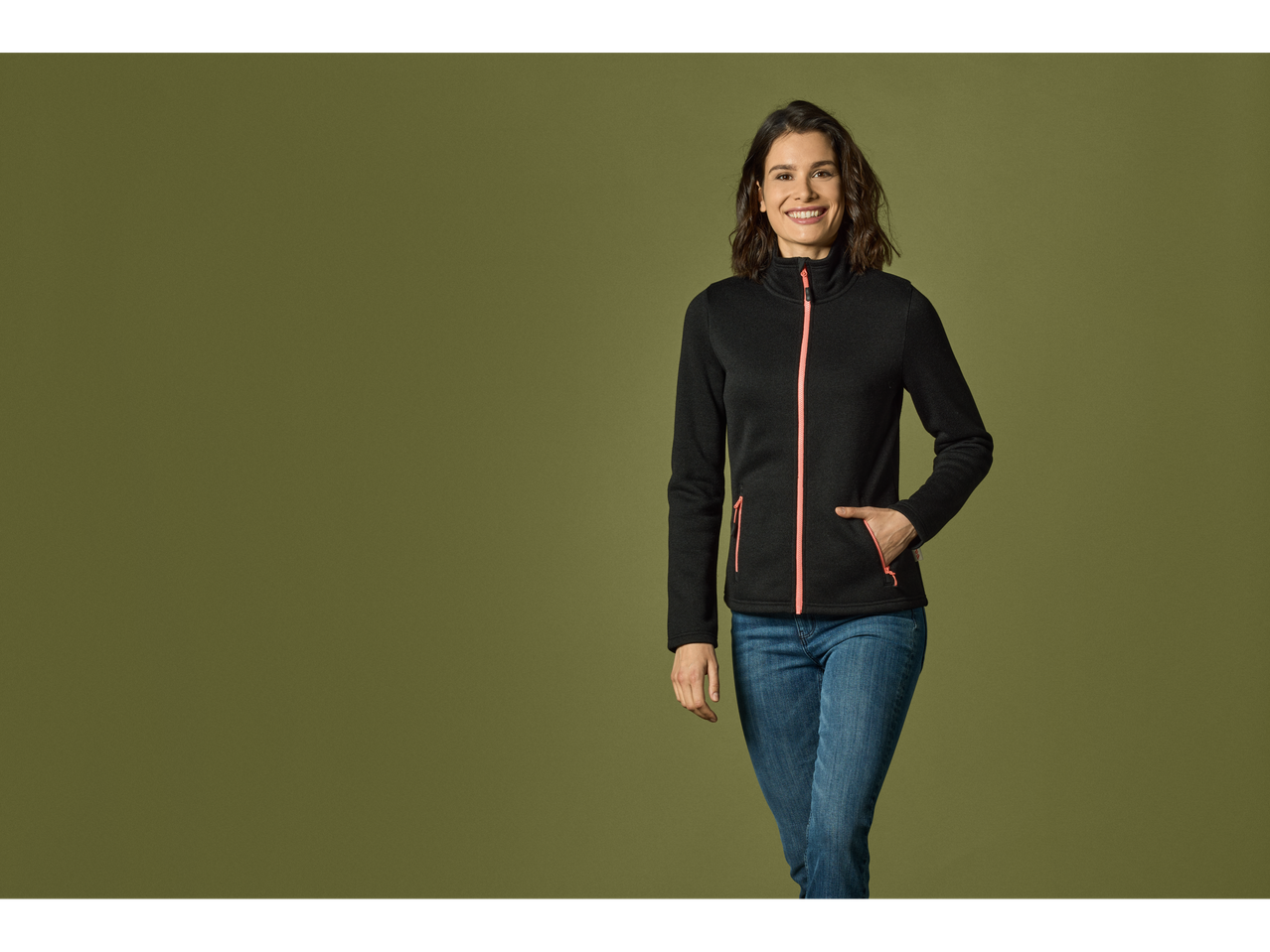 Woman in a black fleece jacket.