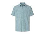 A light blue short-sleeved button-down shirt.