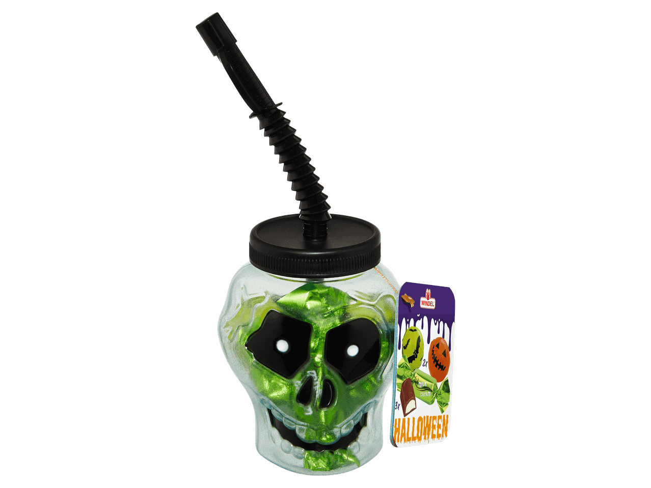 Zöld koponya alakú pohár szívószállal és halloweeni édességekkel.