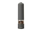 A gray SilverCrest electric pepper grinder filled with peppercorns.