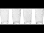 Four clear vintage-style glasses.