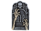 Halloween tombstone decoration with skeleton hands and a skull.