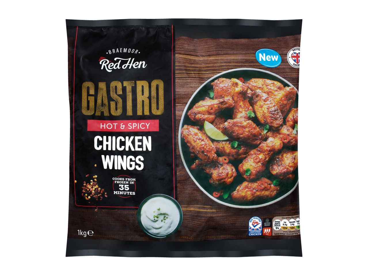 Frozen hot & spicy chicken wings in a black bag, with a bowl of wings and dip.