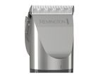 Close-up of a silver hair clipper with a textured blade and a dark grey base.
