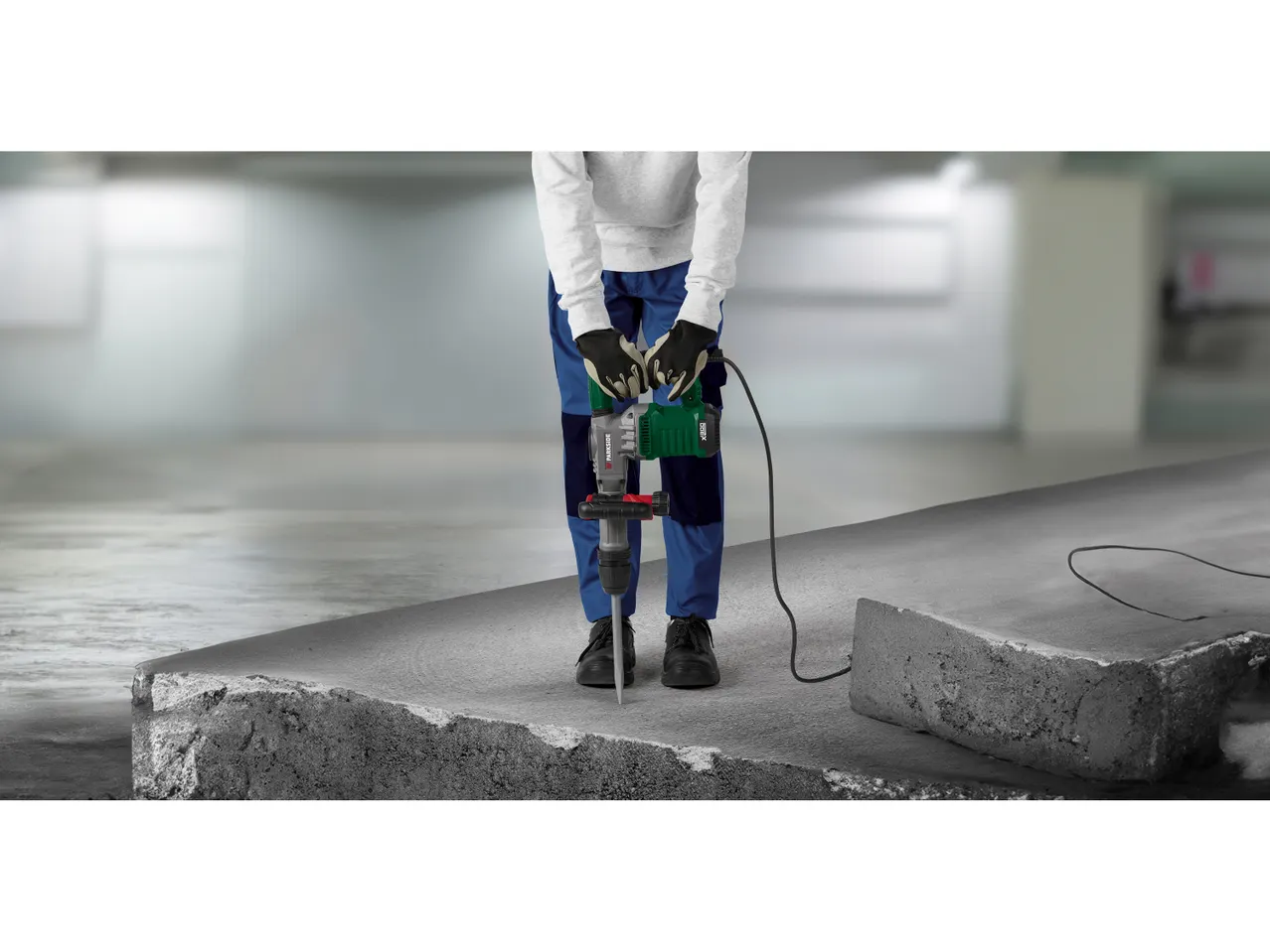A person uses a PARKSIDE® Demolition Hammer