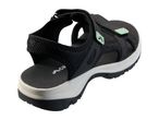 Black and white children's sandal with light green accents and adjustable straps.