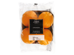 A package of four Deluxe brand oranges, naturally ripened for extra sweetness.
