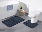 Navy blue striped bath mat set with a larger bath mat and a smaller toilet mat.