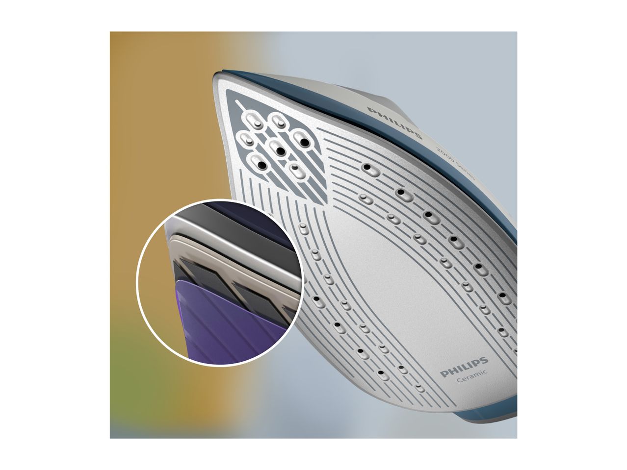 Close-up of an iron's soleplate with a magnified view of its internal layers.