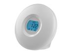 Round white wake-up light with a blue digital display showing the time and date
