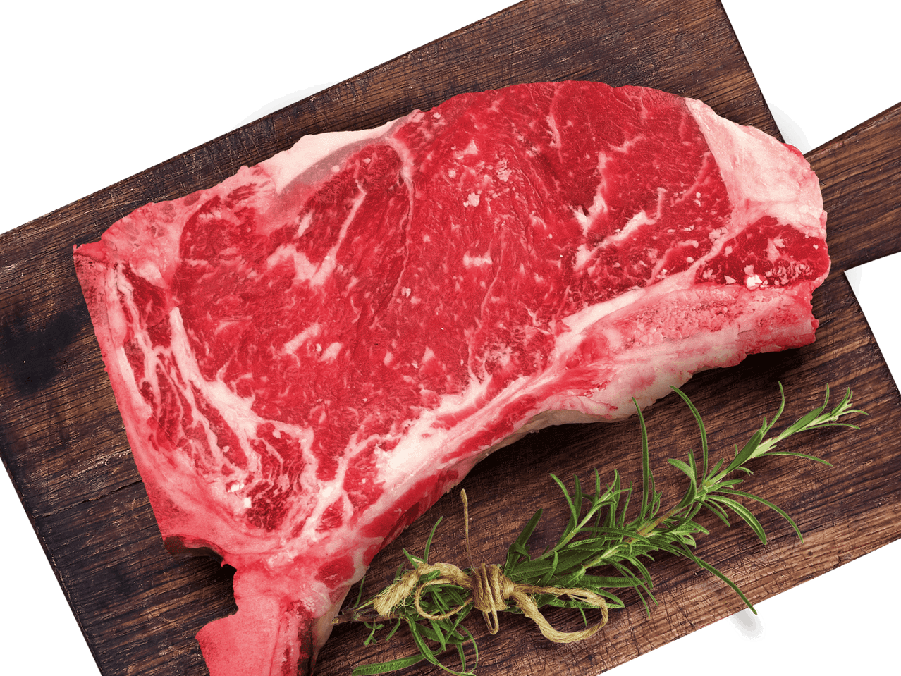 Rindersteaks mit Rosmarin auf einem Holzbrett.