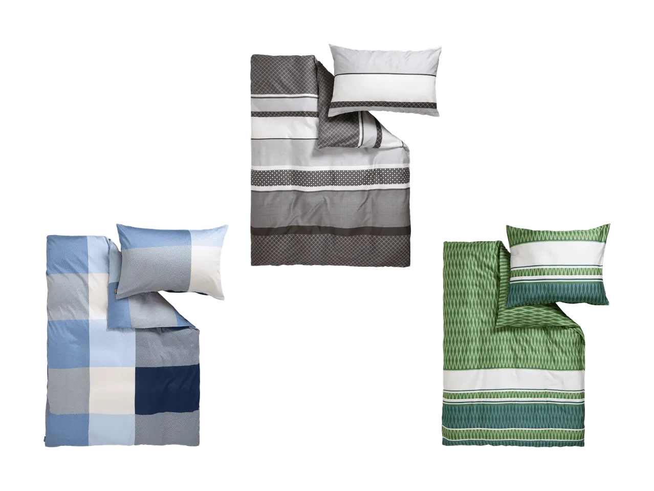 Drei Bettwäsche-Sets mit geometrischen Mustern in Blau, Grau und Grün.