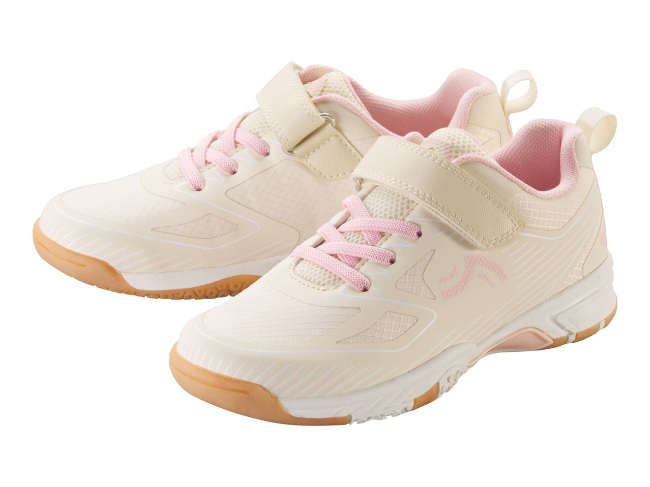 Cream children's sneakers with pink accents.