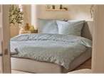 LIVARNO home Renforcé Duvet Cover Set with floral pattern in a bedroom.