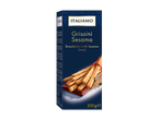 Paquet de gressins au sésame sur fond bleu foncé, avec des gressins et des graines de sésame.
