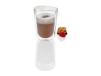 Double-walled glass holds a latte next to a small pastry.