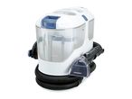Portable carpet and upholstery cleaner with hose and spray nozzle