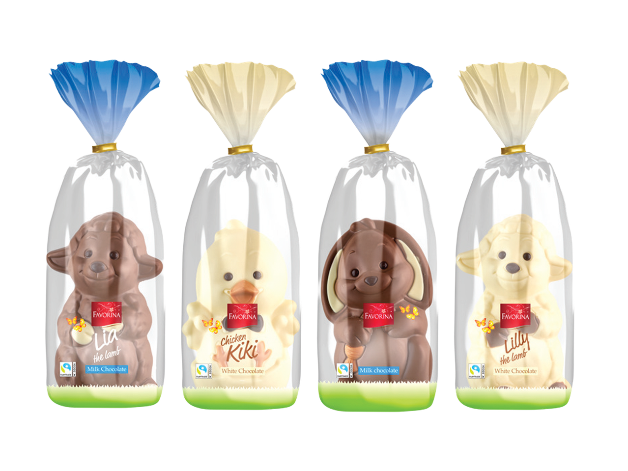 Četiri čokoladne figure životinja u providnom pakovanju: dva jagnjeta od mlečne čokolade, pile od bele čokolade i zec od mlečne čokolade.