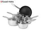 A set of stainless steel pots and pans with glass lids, including a frying pan.
