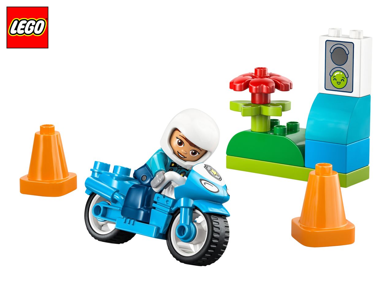 Toy motorcycle with rider, traffic cones, and a traffic light with a happy face.