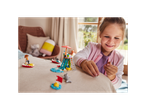LEGO summer toys: a girl plays with a water park set and accessories.