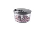 A gray manual food chopper with finely diced red onions inside.