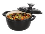 Black cast iron pot with a lid, filled with stew.