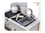 Toy kitchen with marble-effect countertop, rose gold tap, sink, hob, and cooking pot.