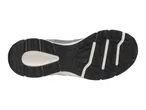 Bottom view of a grey and black athletic shoe with a textured sole.