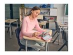 A girl in a classroom, wearing a pink long-sleeve shirt, selecting a pen from a pencil case.