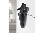 A SILVERCREST® Cordless Hand-Held Vacuum Cleaner mounted on a white wall