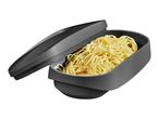 Gray microwave pasta cooker with a lid, filled with cooked spaghetti.