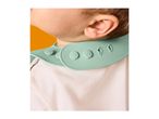 Close-up of a baby wearing a mint green silicone bib over a white t-shirt.