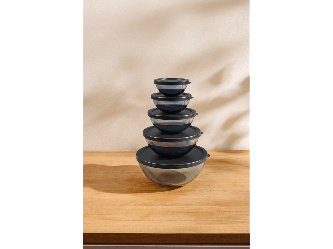 SILVERCREST® Glass Bowl Set, stacked on a wooden surface.