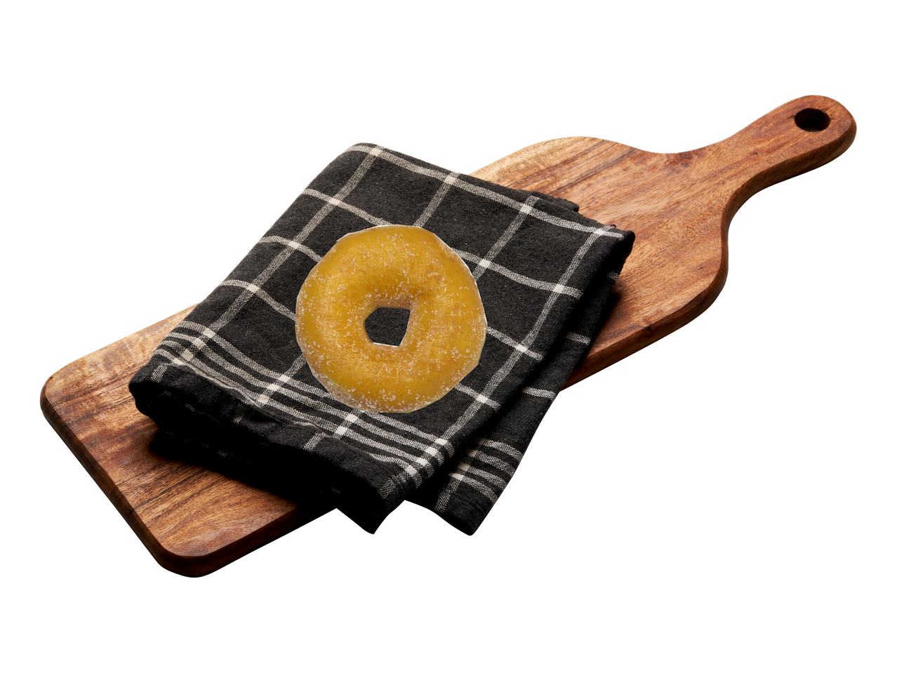 Donut på träbräda med handduk.