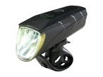 Black bicycle headlight with a bright beam, mounted on a handlebar bracket.