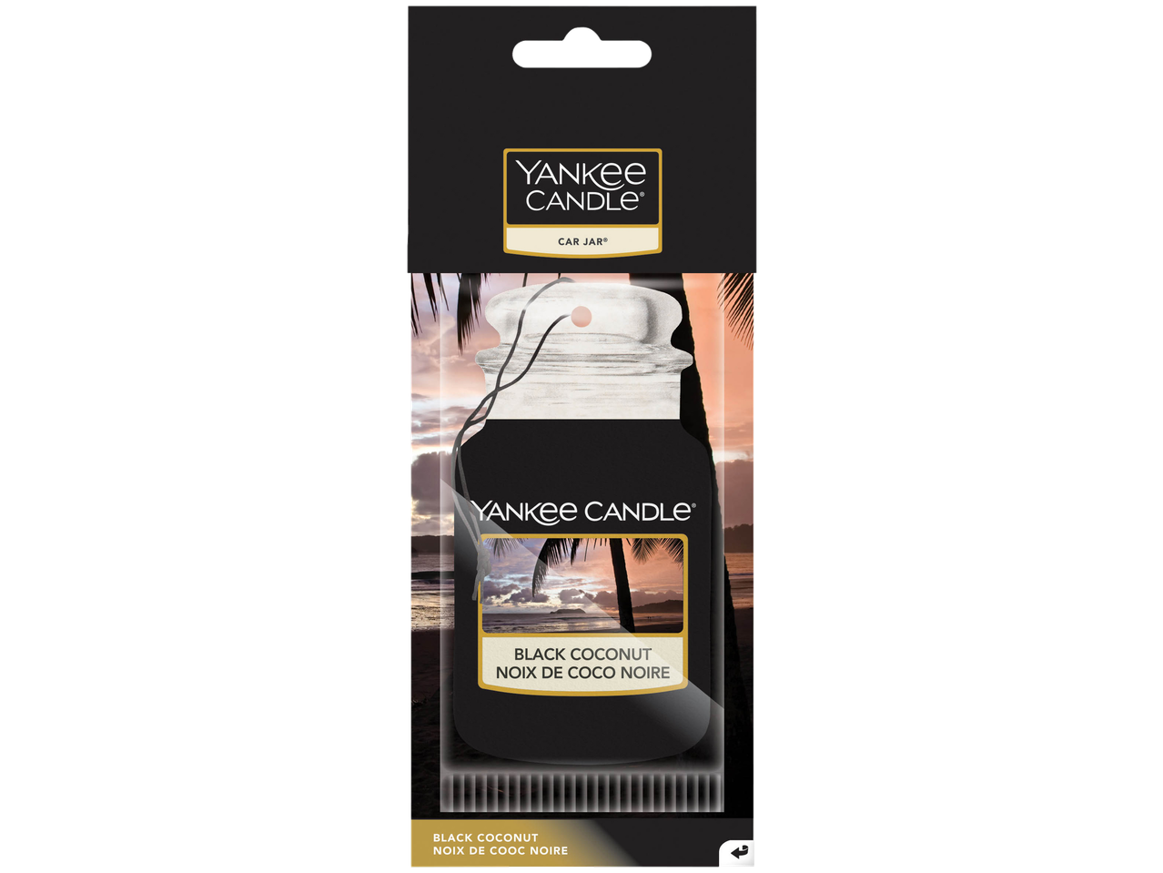 Yankee Candle Black Coconut auto luchtverfrisser met een afbeelding van een strand bij zonsondergang.