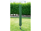 Green rotary dryer cover in a garden with a hedge and house in the background.