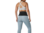 CRIVIT Sports Back Brace and sports bra, worn by a woman from behind.