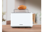 White Silvercrest toaster with a bun on the warming rack.