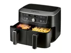 Dual-basket air fryer with a whole chicken and french fries, displaying 180°C and cooking functions.