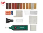A wood repair kit with various colored wax sticks, batteries, tools, and cloths.