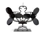 Black twin-fan stove fan with a decorative, wavy frame and a sturdy base.