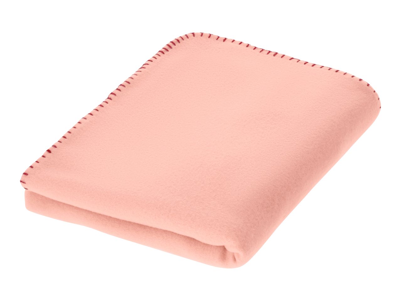 Folded pink fleece blanket with red stitching along the edges